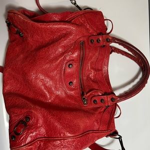 red balenciaga velo bag.
